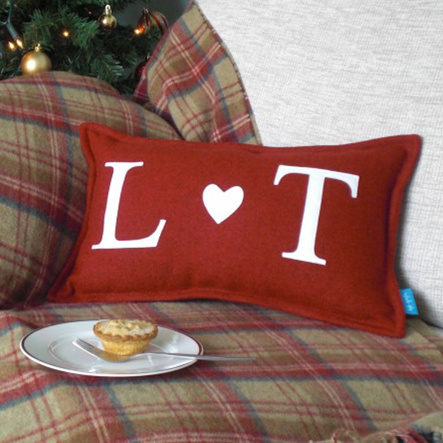 Christmas Couples Initials Cushion with Heart lifestyle shot by Kate Sproston Design