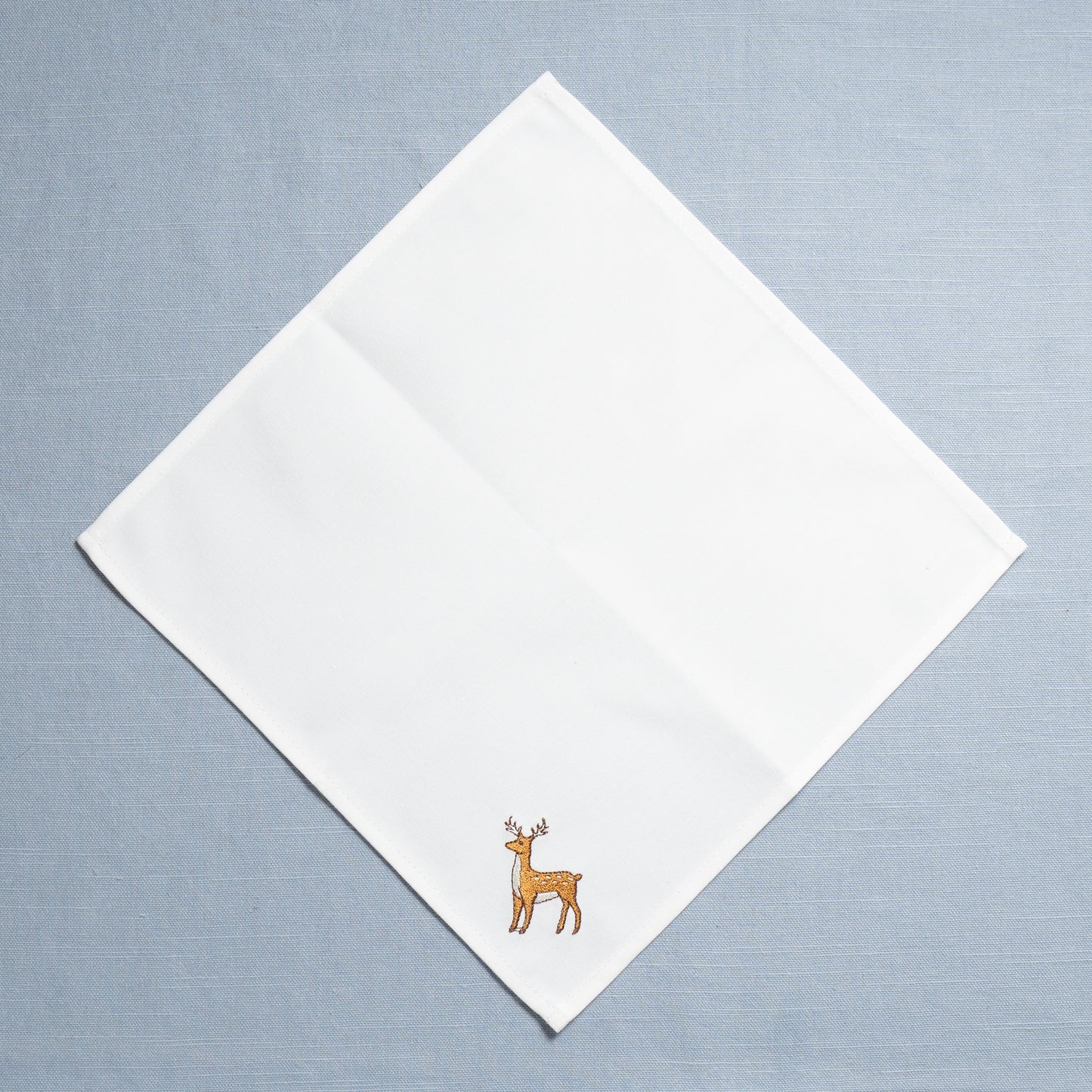 Second - Set of Five Embroidered Organic Cotton Reindeer Cocktail Napkins