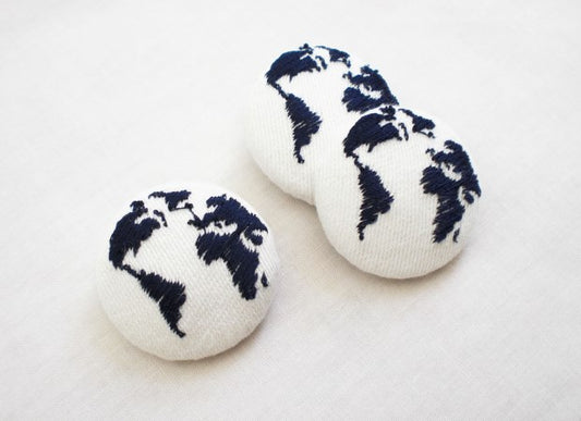 Embroidered Ivory Globe Buttons by Kate Sproston Design