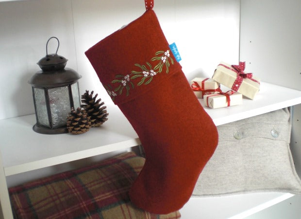 Red Mistletoe Christmas Stocking lifestyle shot by Kate Sproston Design