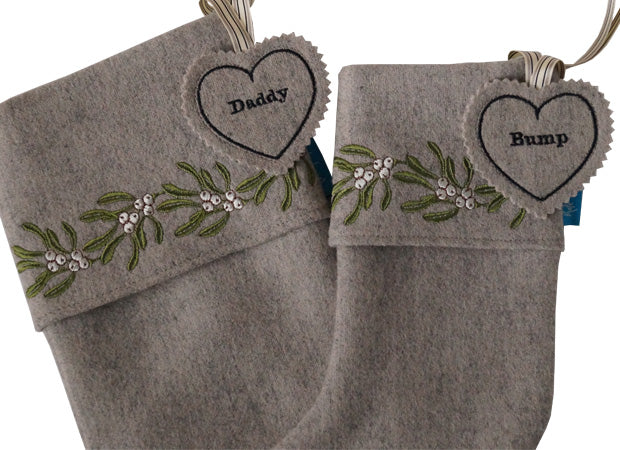 Stone Mistletoe Christmas Stockings with close up shot of personalised name tag by Kate Sproston Design