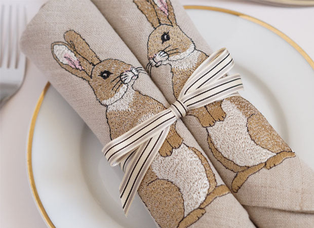 Two Linen Embroidered Rabbit Napkins Lifestyle Shot by Kate Sproston Design