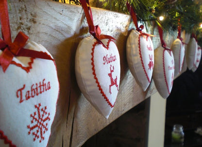 Small Scandi Cross Stitch Decorations above the Fireplace by Kate Sproston Design